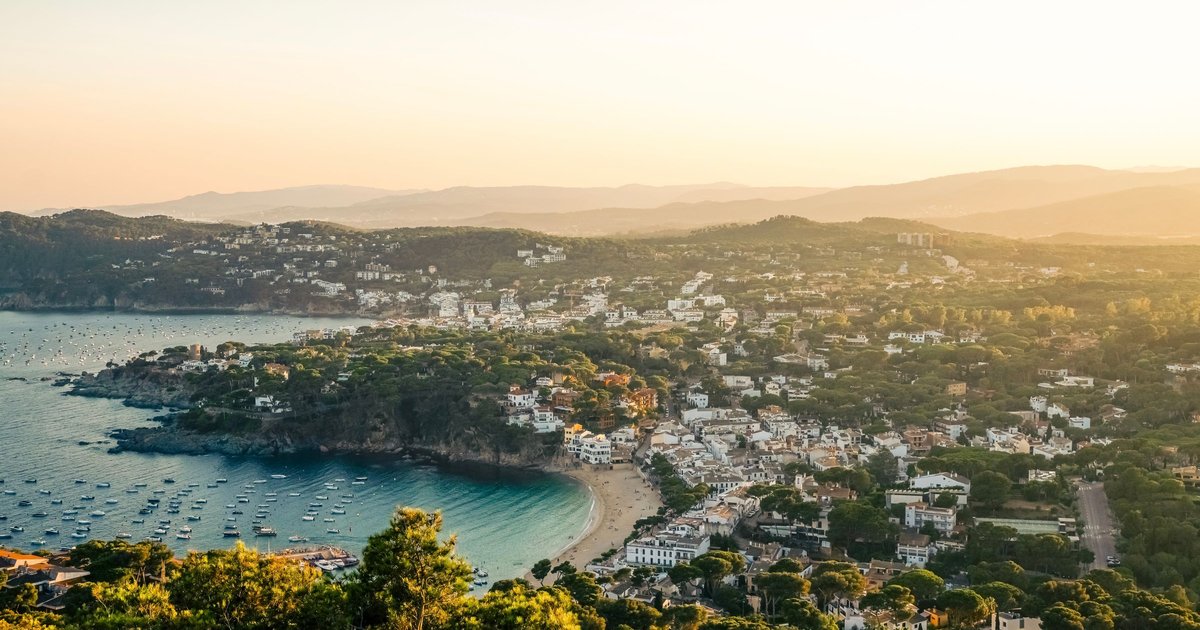 Scenic aerial view of Llafranc coastline at sunset, Costa Brava, Spain