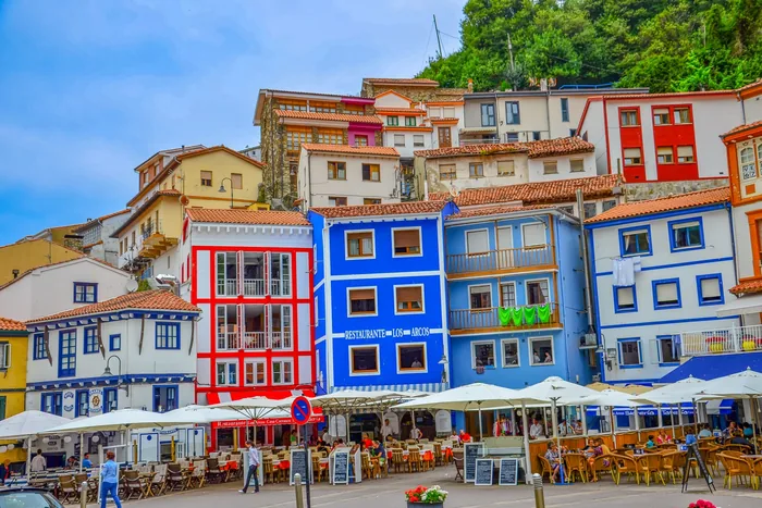 Bright colourful building facades on a street in Spain